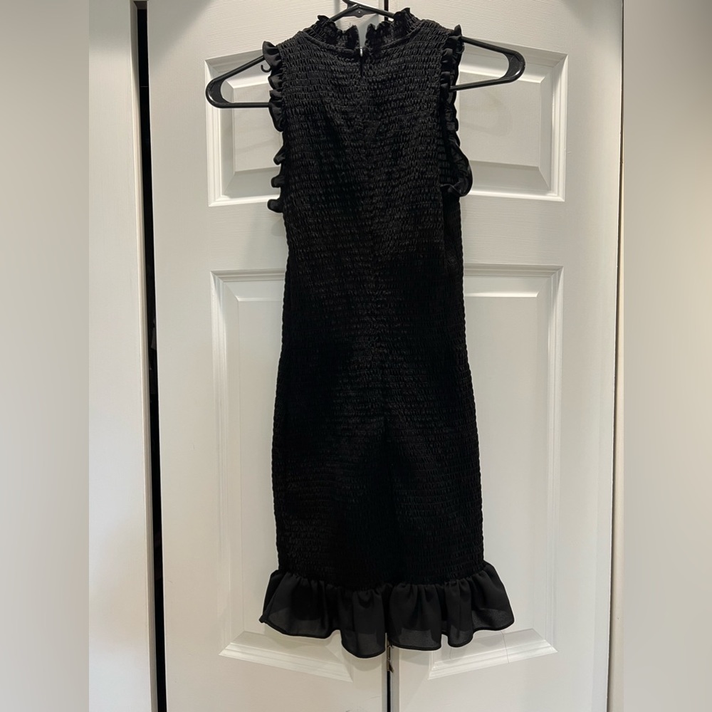 Likely black ruched dress.